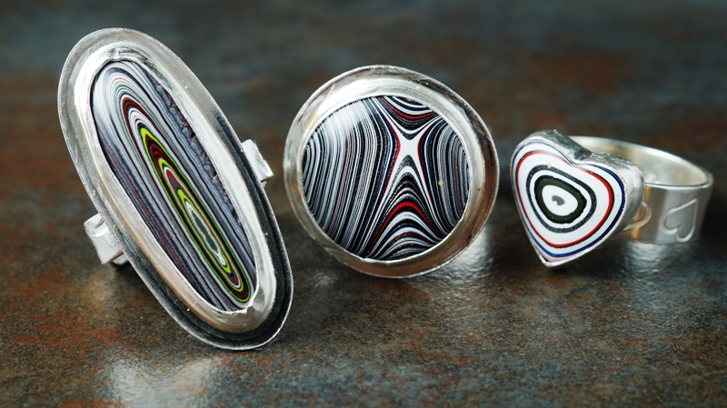 Handcrafted recycled sterling silver Fordite rings