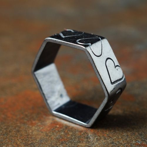 Handcrafted oxidised sterling silver hexagonal heart stamped ring