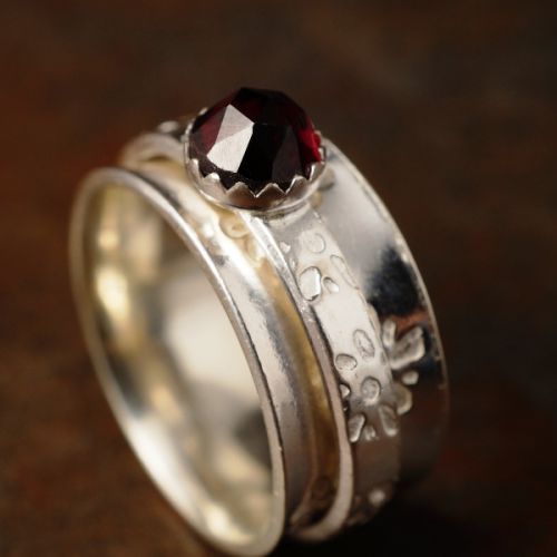 Handcrafted recycled stamped sterling silver facetted Garnet Spinner ring