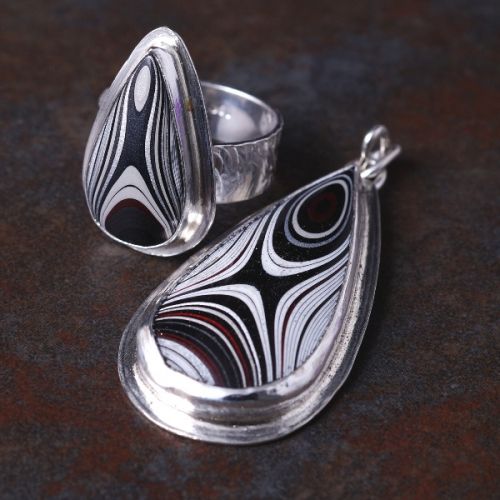 Handcrafted recycled sterling silver teardrop Fordite ring and matching pendant