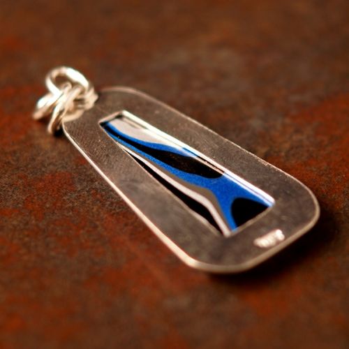 Handcrafted recycled sterling silver trapezoid Fordite pendant.jpg