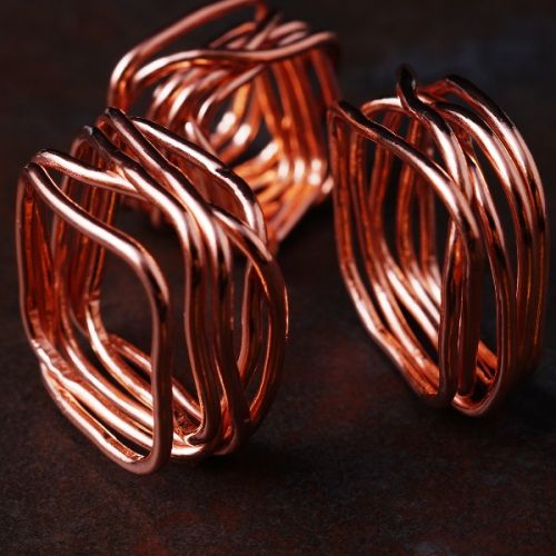 Handcrafted recycled copper order out of chaos rings