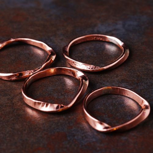 Handcrafted recycled copper wave rings