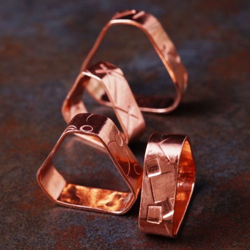 Handcrafted recycled copper triangular rings