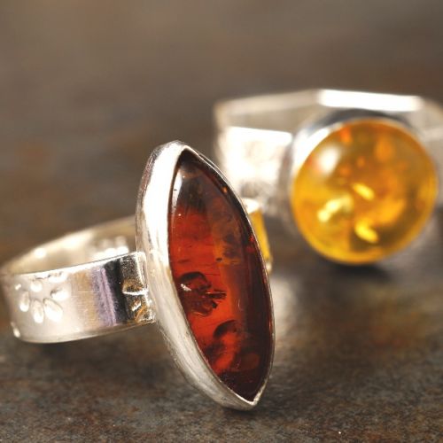 Handcrafted recycled stamped sterling silver baltic amber rings