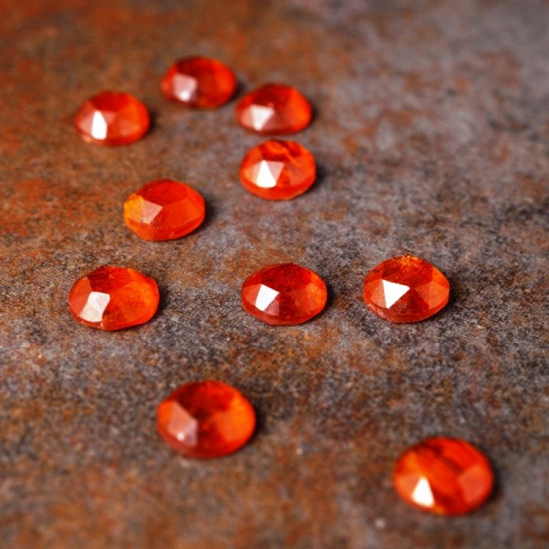 Facetted Orange Kyanite cabochon