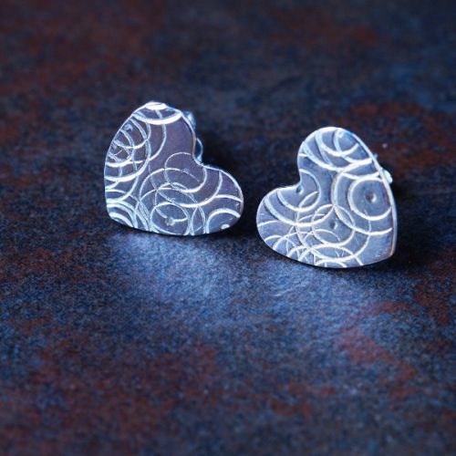 Handcrafted recycled sterling silver stamped heart studs